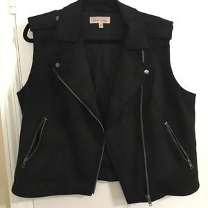 Fun black vest!  Pairs with everything!